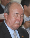 난감한 표정의 정종환 국토해양부 장관